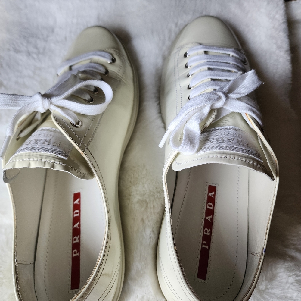 Prada Off White Patent Leather Tennis shoes.  SZ 41-US 10 PRE LOVED